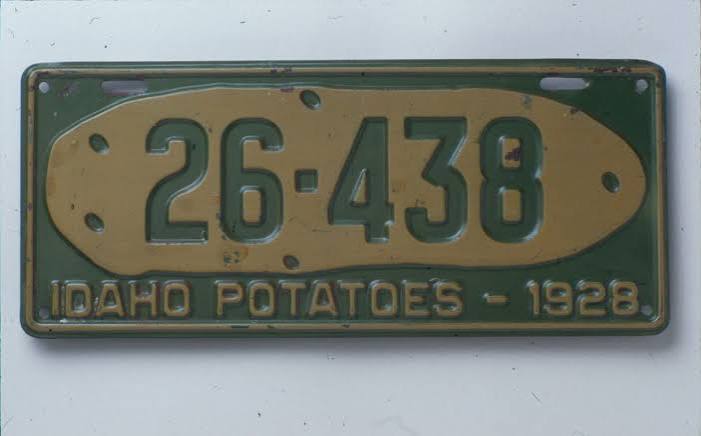 1928 Idaho Potatoes license plate with potato graphic