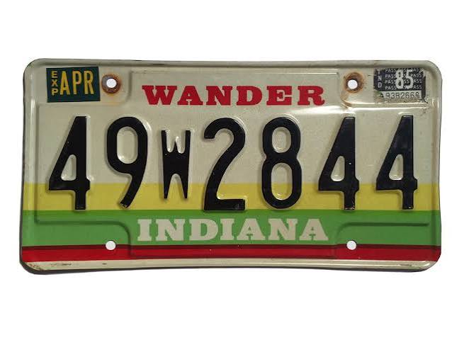 Indiana Wander Indiana license plate from the mid-1980s with a colorful graphic background