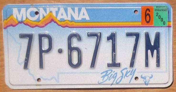 2000 Montana Big Sky graphic plate with purple and gold mountains and plains