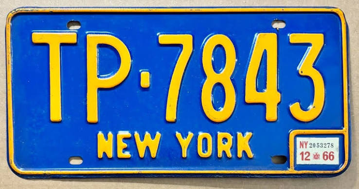 New York 1966 blue-base passenger license plate with orange characters