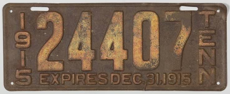 1915 Tennessee state-issued license plate, dark blue with an embossed white serial