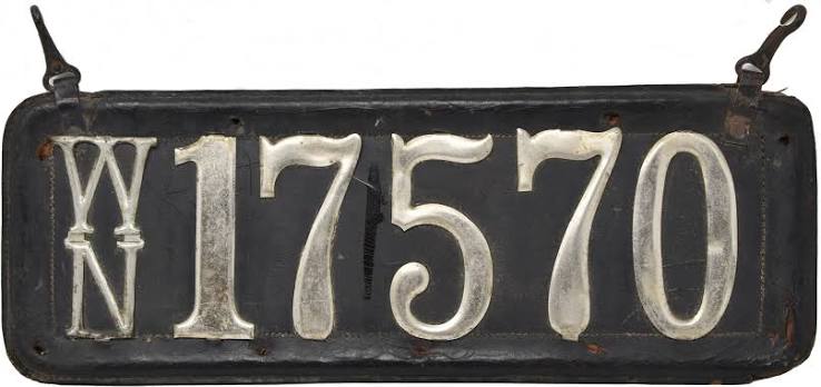 Pre-state Washington plate from 1905, a leather plate with the registration number 1014 hand-painted on it