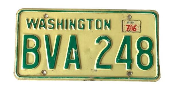 Mid-1960s Washington license plate, green serials on white with WASHINGTON across the bottom