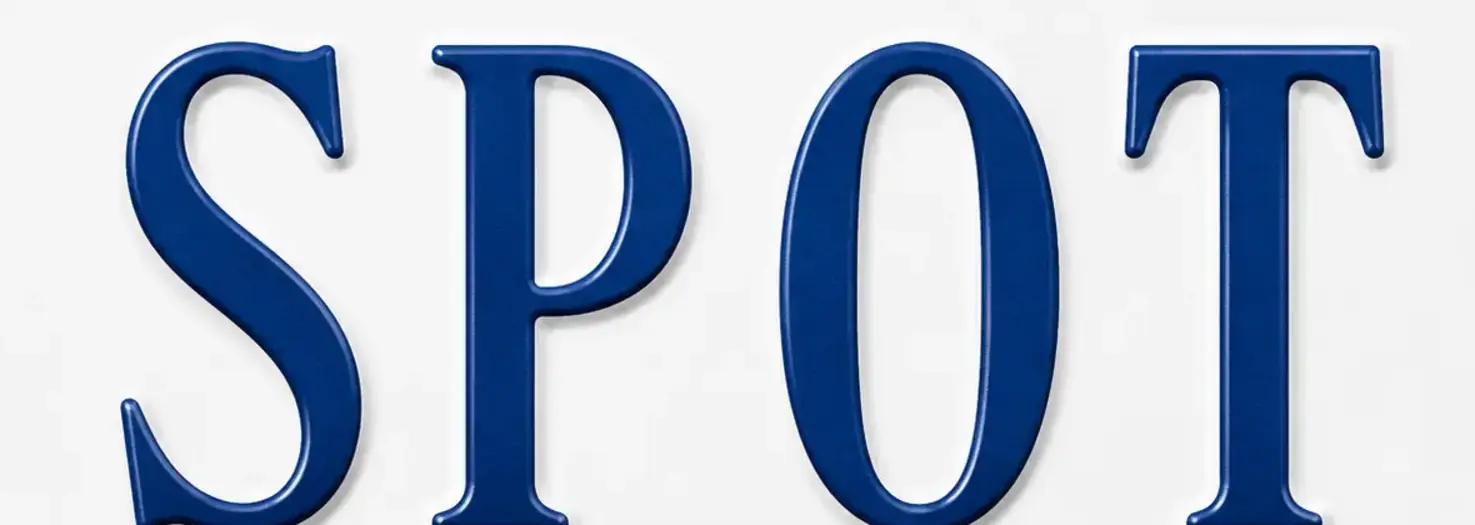 Close-up crop of the large dark blue letters and numbers on a Virginia license plate
